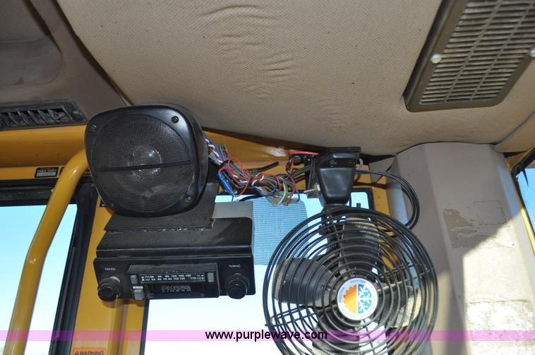 image for item F2174 1999 John Deere 772CH articulated motor grader