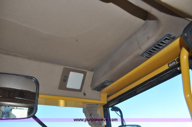 image for item F2174 1999 John Deere 772CH articulated motor grader