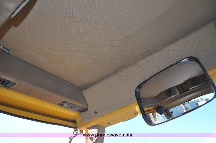 image for item F2174 1999 John Deere 772CH articulated motor grader