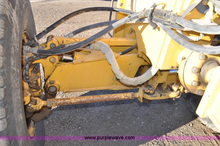 image for item F2174 1999 John Deere 772CH articulated motor grader