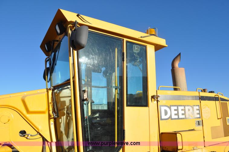 image for item F2174 1999 John Deere 772CH articulated motor grader