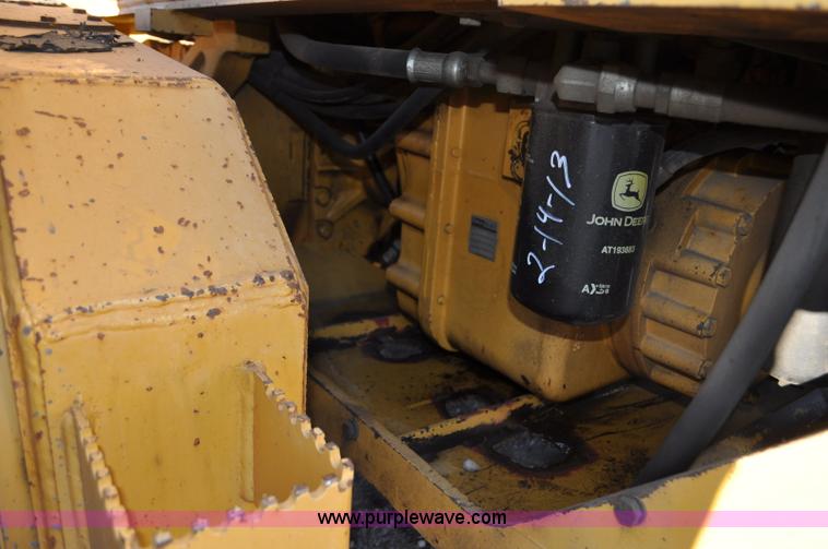 image for item F2174 1999 John Deere 772CH articulated motor grader