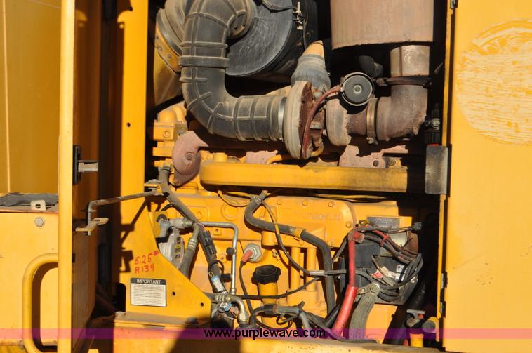 image for item F2174 1999 John Deere 772CH articulated motor grader