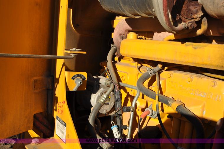 image for item F2174 1999 John Deere 772CH articulated motor grader