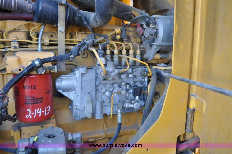 image for item F2174 1999 John Deere 772CH articulated motor grader