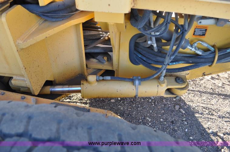 image for item F2174 1999 John Deere 772CH articulated motor grader