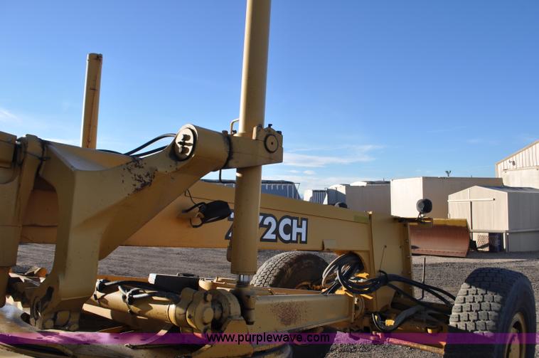 image for item F2174 1999 John Deere 772CH articulated motor grader