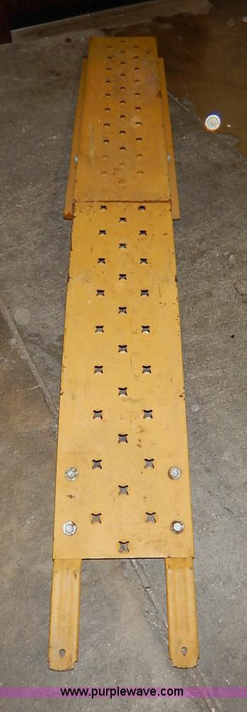 image for item AV9651 (2) folding trailer ramps