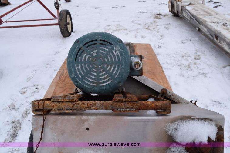 image for item E6010 Speed King under car fertilizer conveyor