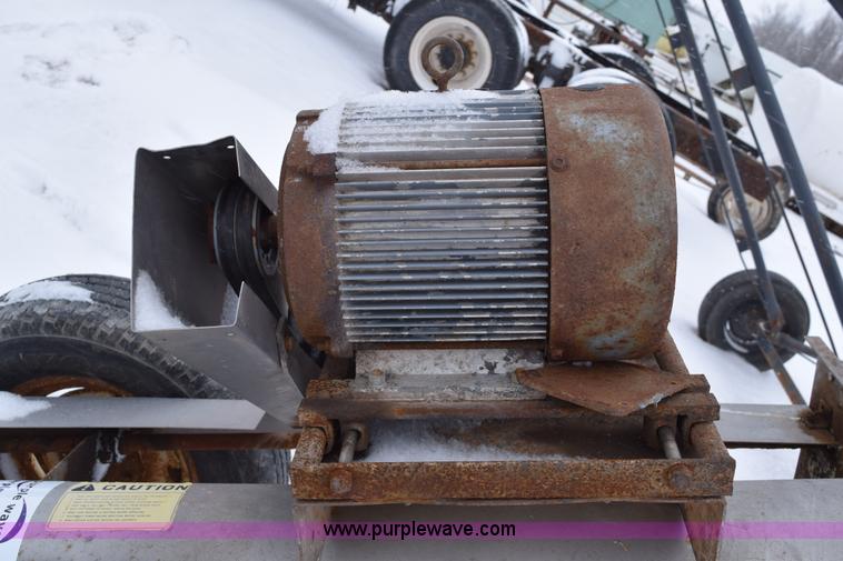 image for item E6011 Speed King under car fertilizer conveyor