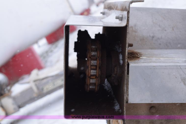 image for item E6011 Speed King under car fertilizer conveyor