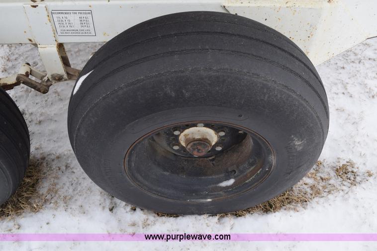 image for item E6028 Wilmar fertilizer spreader buggy