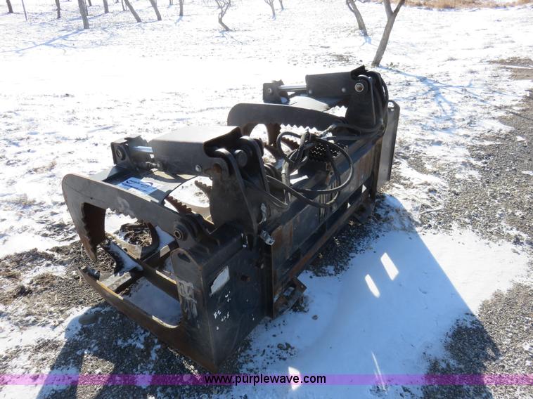 image for item I2276 2011 Caterpillar 72" grapple skid skid steer bucket