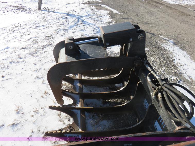 image for item I2276 2011 Caterpillar 72" grapple skid skid steer bucket