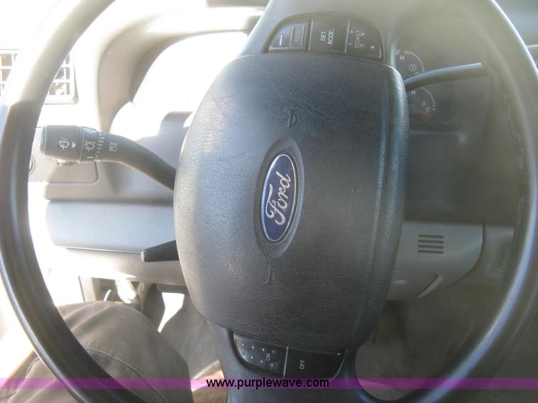 image for item K2772 2003 Ford F450 Super Duty XL flatbed truck