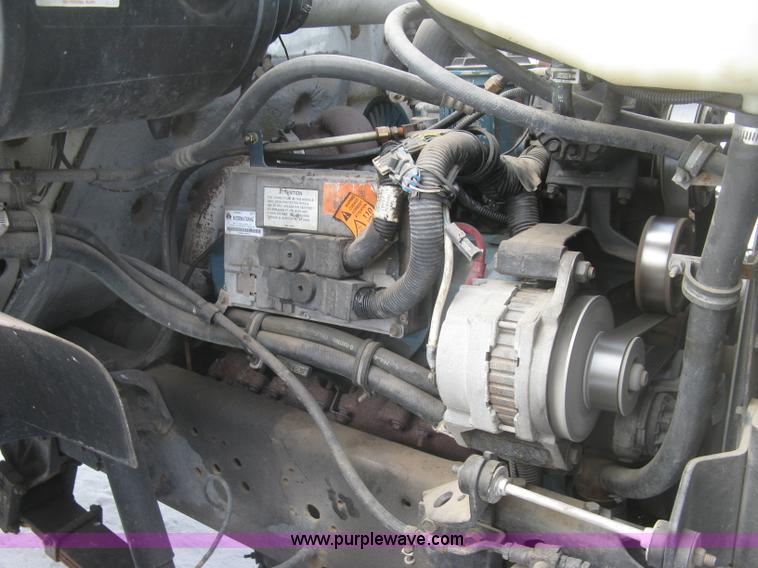 image for item K2773 2000 International 4700 flatbed truck