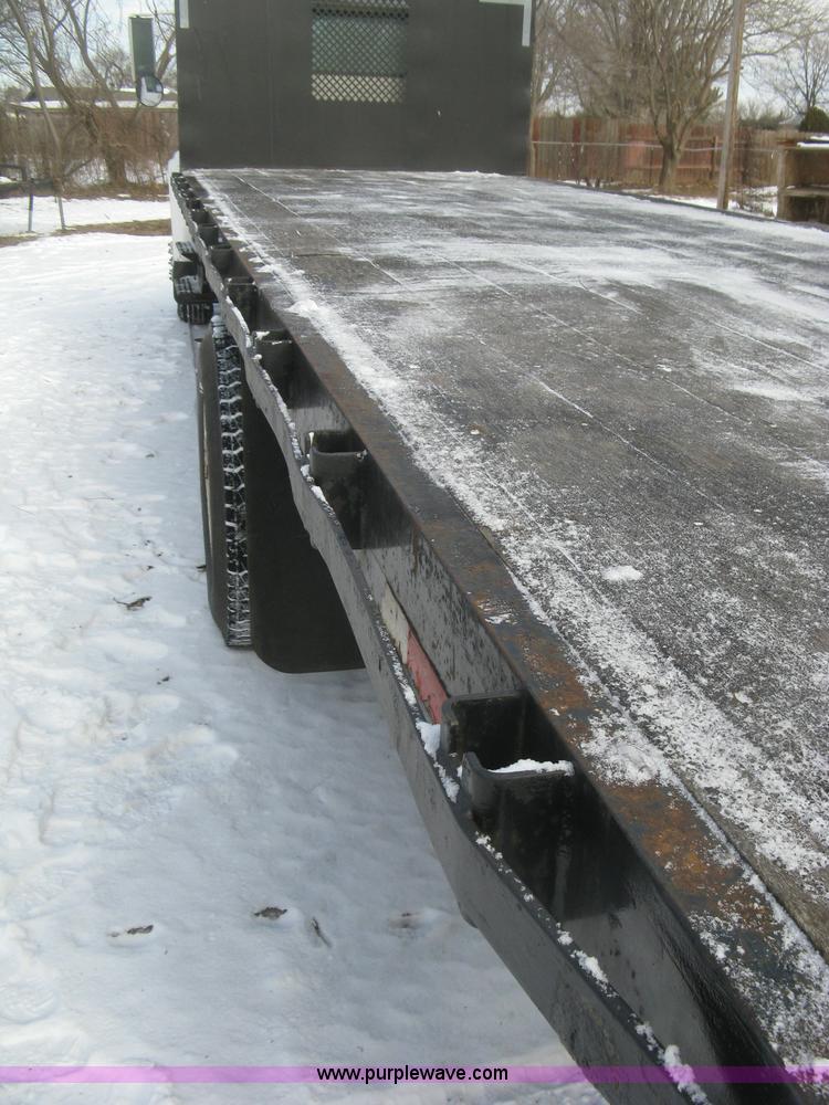 image for item K2773 2000 International 4700 flatbed truck
