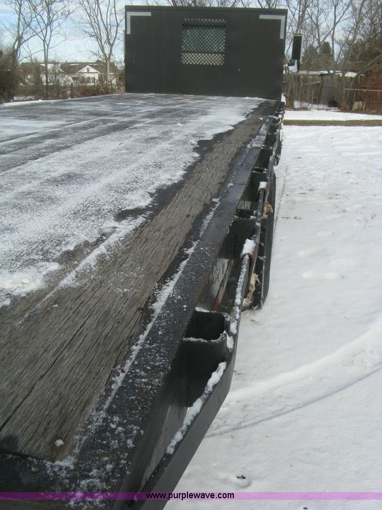 image for item K2773 2000 International 4700 flatbed truck