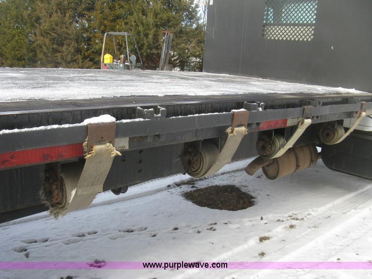 image for item K2773 2000 International 4700 flatbed truck
