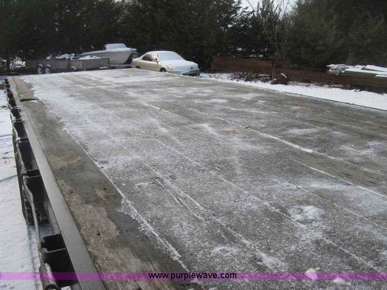 image for item K2773 2000 International 4700 flatbed truck