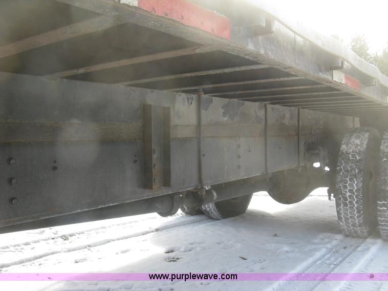 image for item K2773 2000 International 4700 flatbed truck