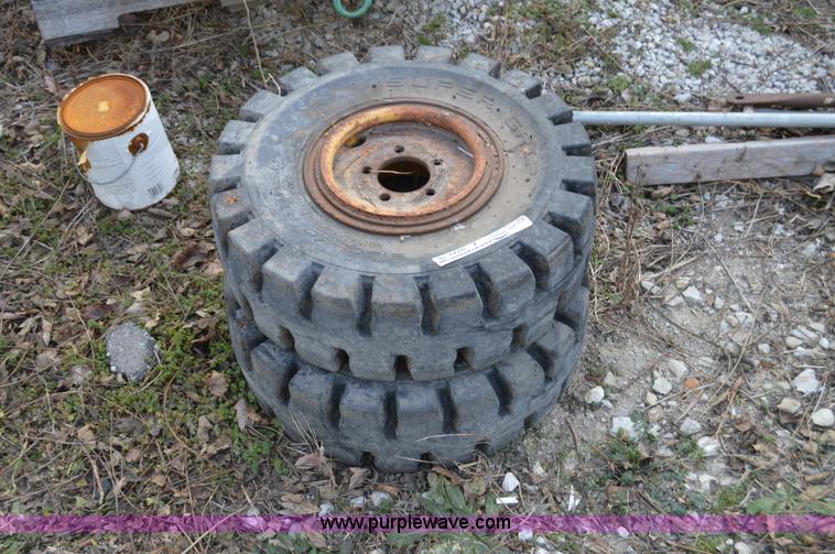 image for item Z9270 (4) solid rubber tires and wheels