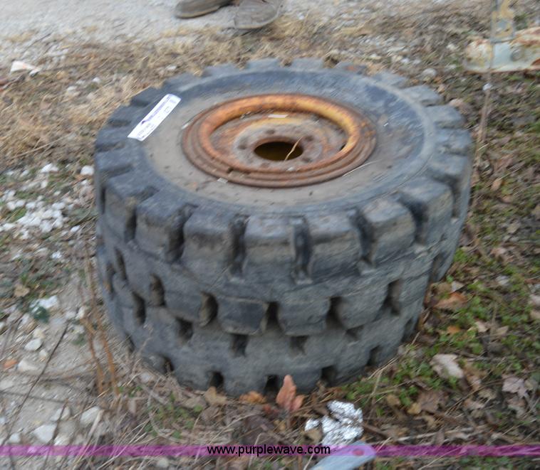 image for item Z9270 (4) solid rubber tires and wheels
