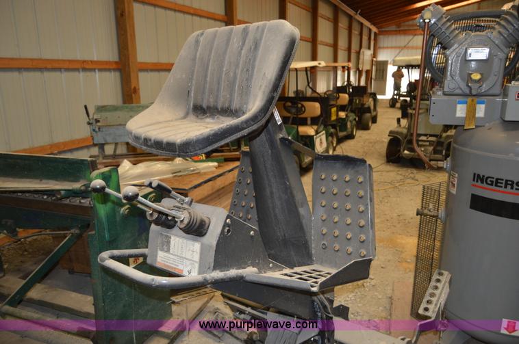 image for item Z9273 Bobcat M06 skid steer backhoe attachment