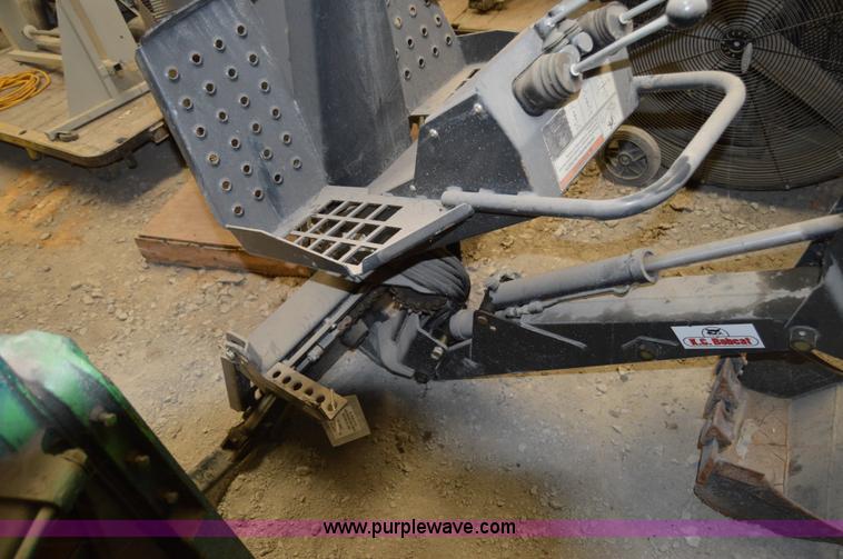 image for item Z9273 Bobcat M06 skid steer backhoe attachment