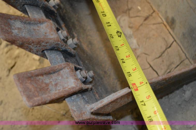 image for item Z9273 Bobcat M06 skid steer backhoe attachment