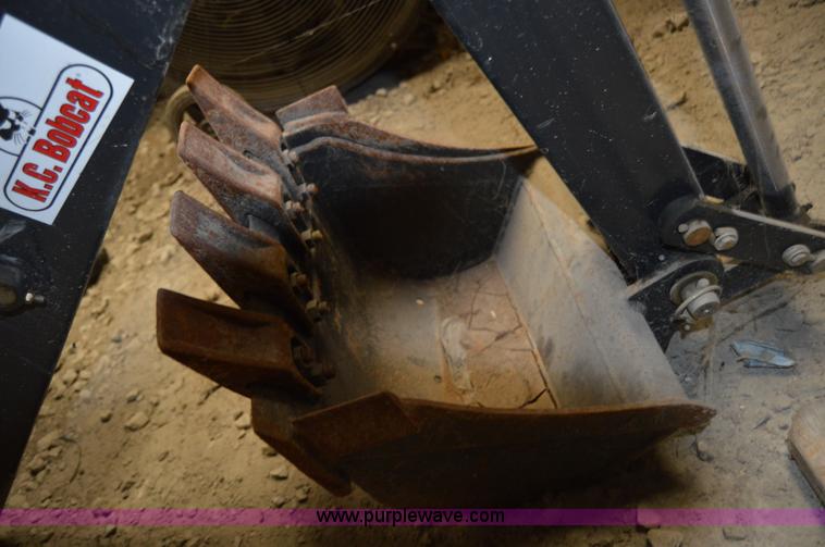 image for item Z9273 Bobcat M06 skid steer backhoe attachment