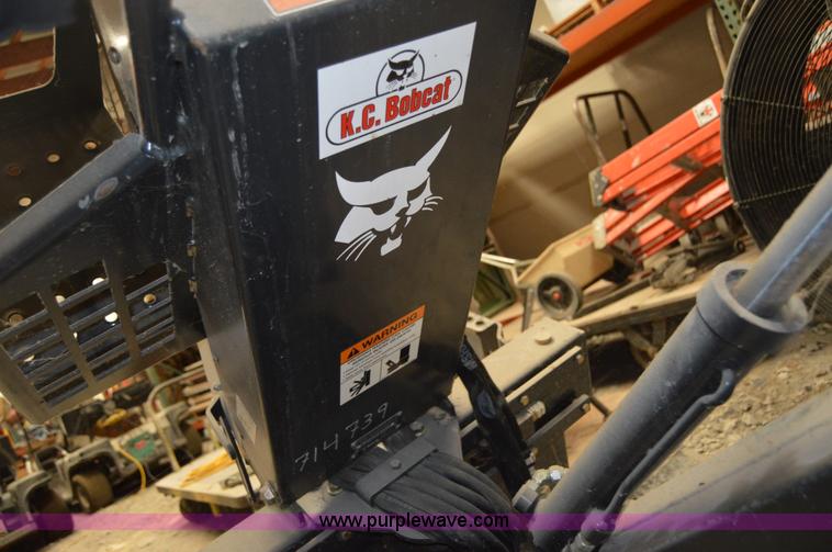 image for item Z9273 Bobcat M06 skid steer backhoe attachment