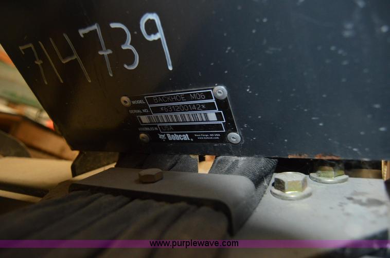 image for item Z9273 Bobcat M06 skid steer backhoe attachment