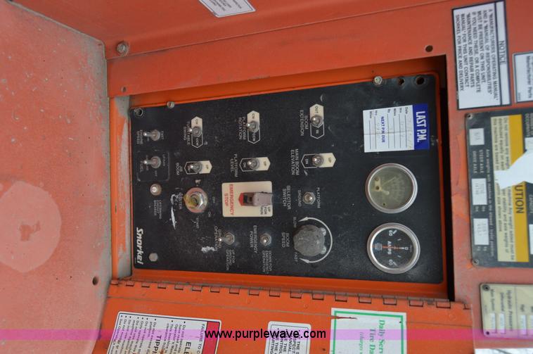 image for item F8915 2001 Snorkel TB66J boom lift