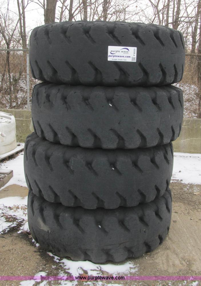 image for item F8930 (4) 17.5R25 tires and wheels