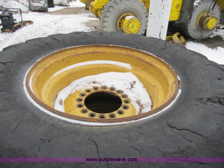 image for item F8930 (4) 17.5R25 tires and wheels