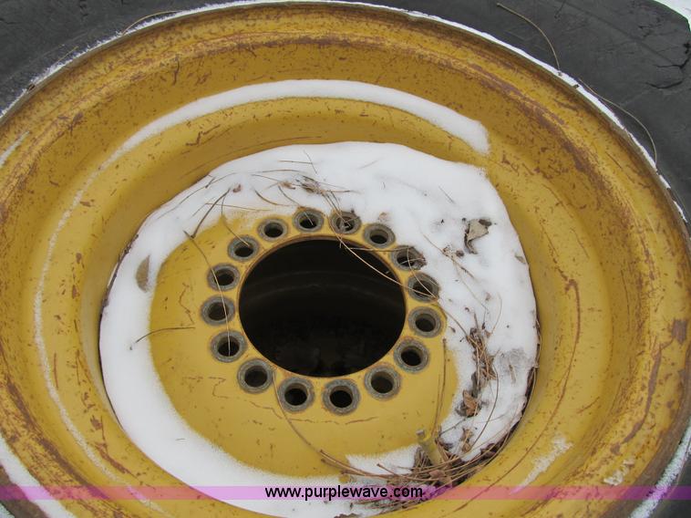 image for item F8930 (4) 17.5R25 tires and wheels