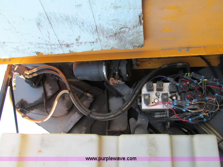 image for item H7617 2004 GMC T7500 Centurion street sweeper