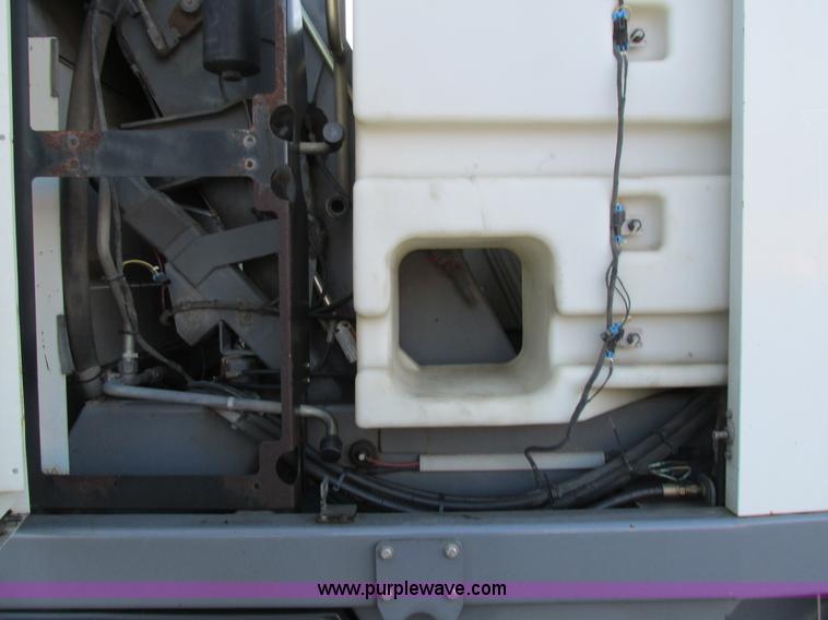 image for item H7618 2005 GMC T7500 Centurion Tennant street sweeper