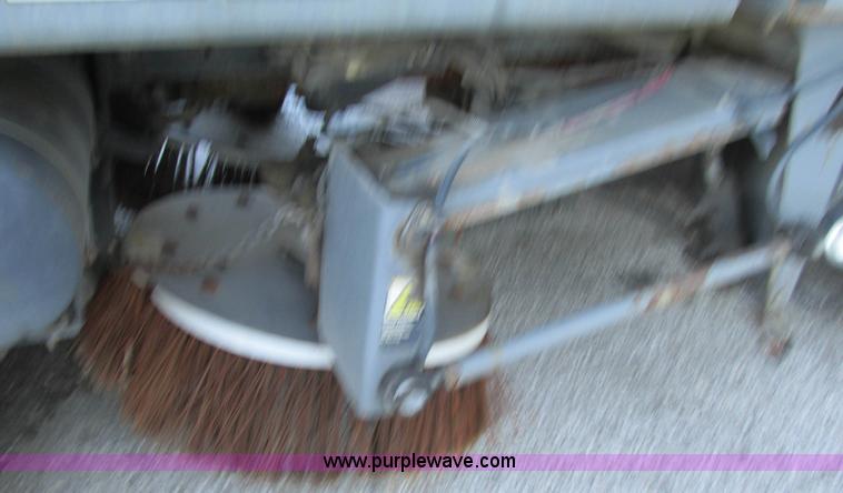 image for item H7618 2005 GMC T7500 Centurion Tennant street sweeper