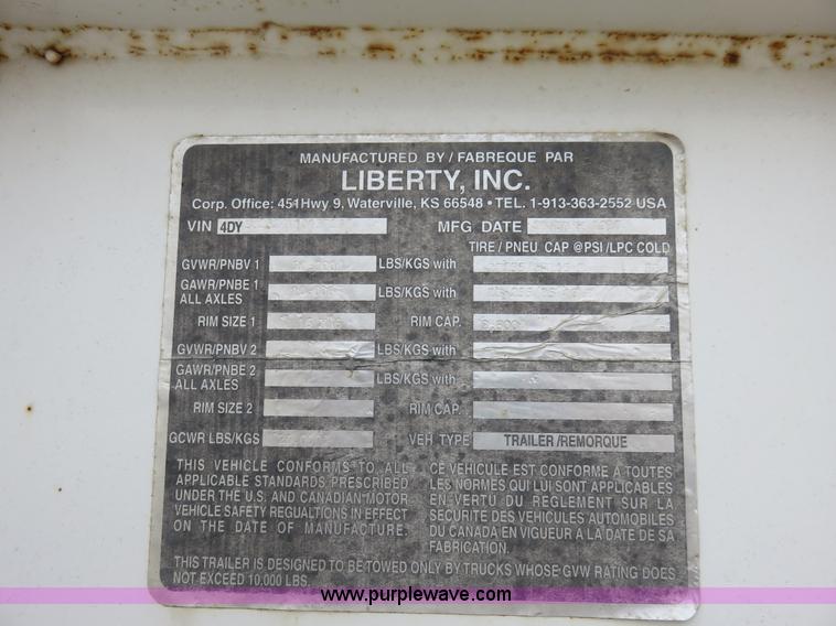 image for item I2454 1997 Travalong flatbed trailer