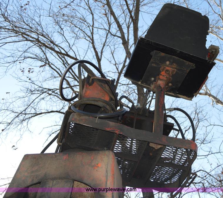 image for item I6869 Prentice 110 truck mounted log grapple