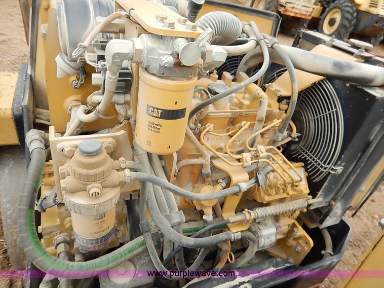 image for item I2447 2000 Caterpillar CB-224D smooth drum roller