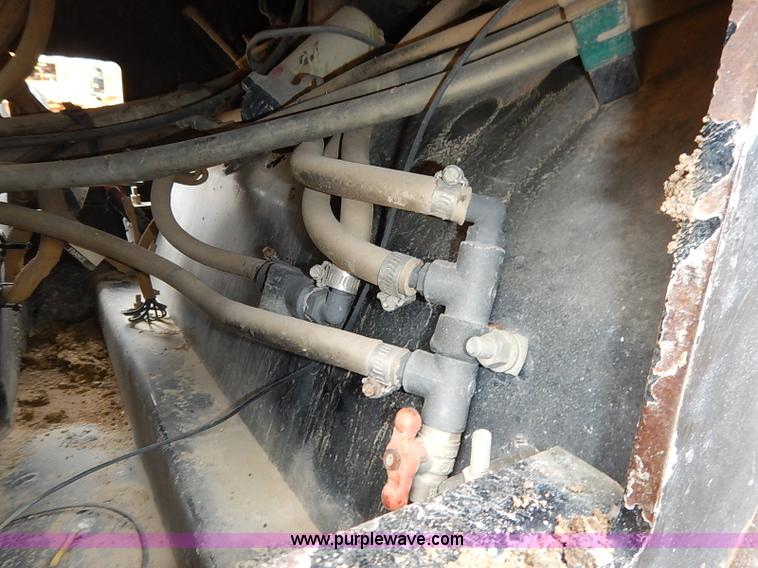 image for item I2447 2000 Caterpillar CB-224D smooth drum roller