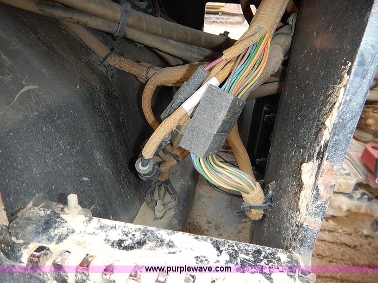 image for item I2447 2000 Caterpillar CB-224D smooth drum roller