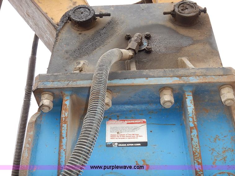 image for item I2451 Okada 318 hydraulic breaker