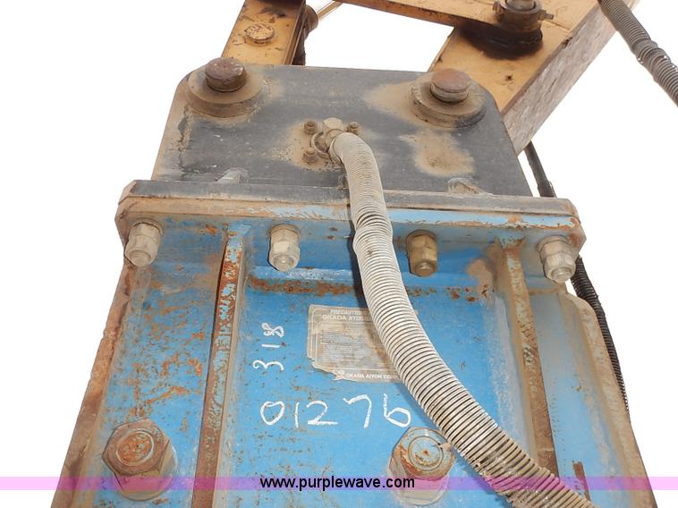 image for item I2451 Okada 318 hydraulic breaker