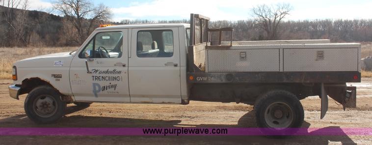 image for item I2463 1995 Ford F350 XL Crew Cab flatbed pickup truck