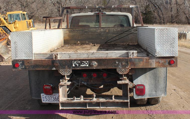 image for item I2463 1995 Ford F350 XL Crew Cab flatbed pickup truck