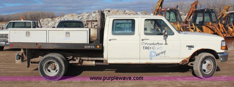 image for item I2463 1995 Ford F350 XL Crew Cab flatbed pickup truck